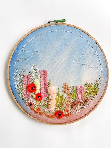 Underwater Bloom – Hand-Embroidered Wall Art (12")
